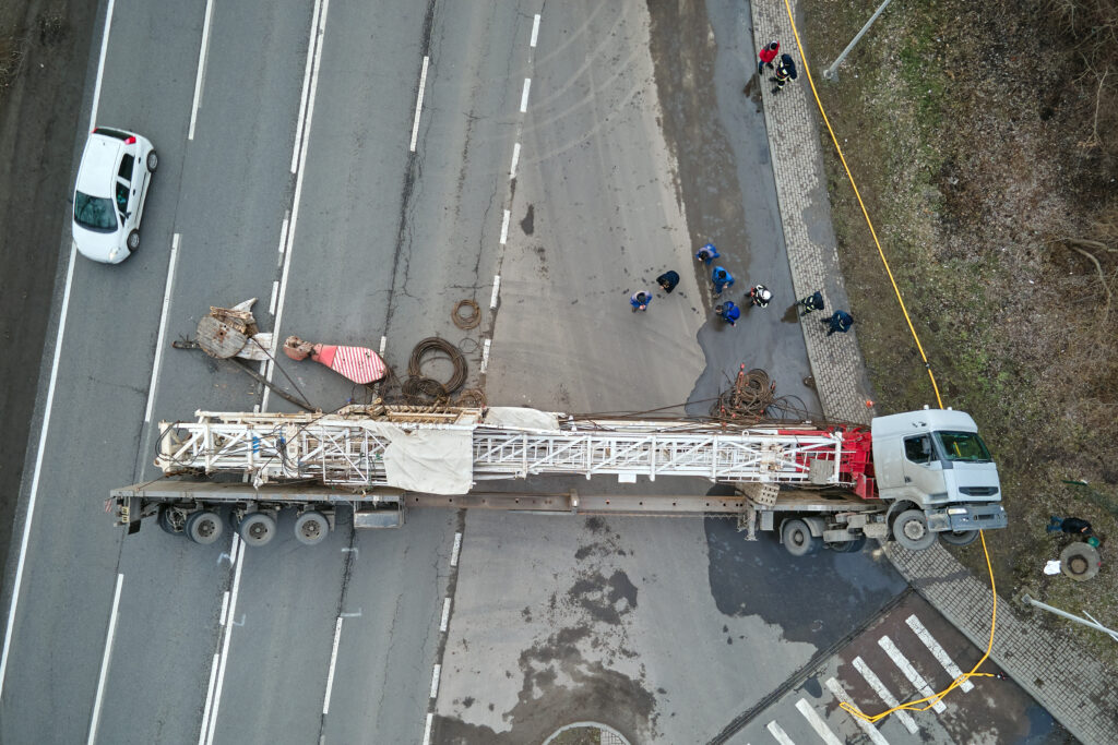 A truck accident lawyer in nevada is needed in this Nevada Truck Accident with overturned truck blocking traffic as seen in an aerial view